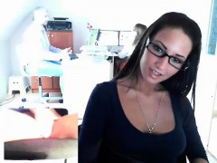 Sultry brunette secretary with glasses exposes herself in t