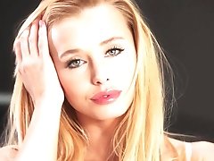 Blonde European model posing for Playboy