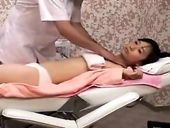 Japanese chick gets dressed for a sensual massage in her un